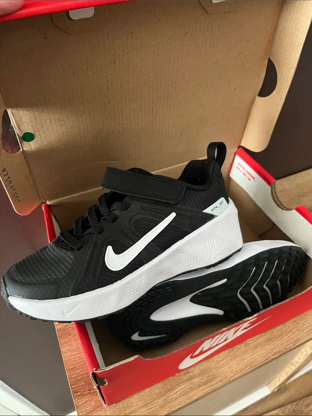 Nike Kids Black and White Low-Top Sneaker with Hook-and-Loop Strap
